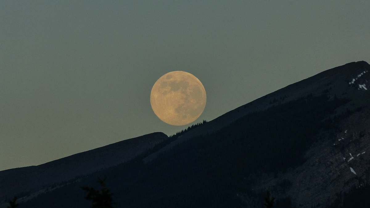 moon silhouette of mountains with moon background night